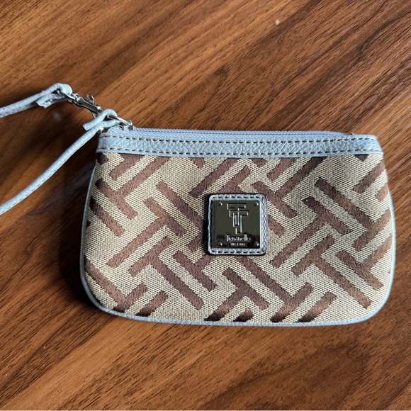 Tignanello Handbags - Tignanello Tan and Brown Wristlet with Logo silver leather trim